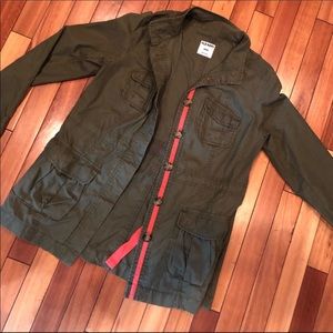 Army green jacket with coral accent